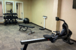 Fitness Center with rowing machine and free weights